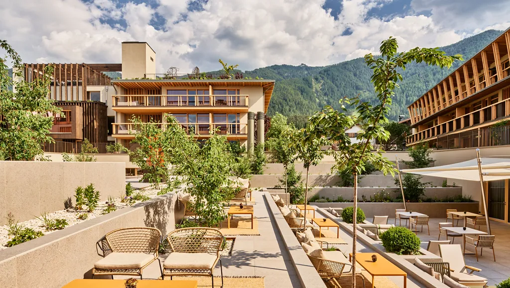 outdoor terrace with sun loungers at the Falkensteiner Hotel