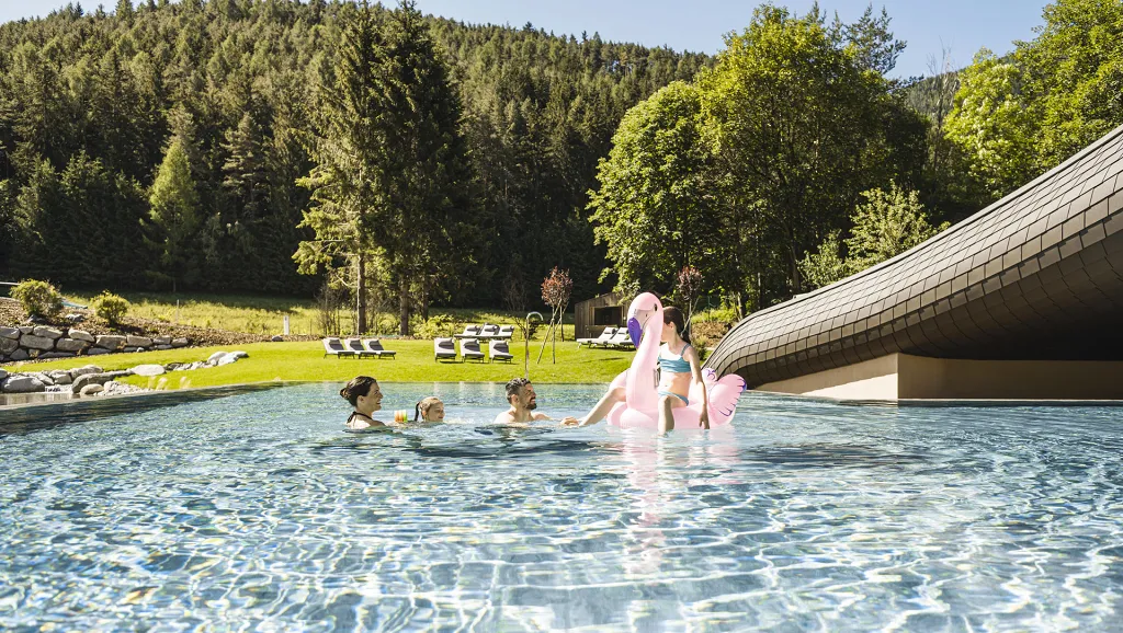 Family in the outdoor pool of Falkensteiner Family Lido