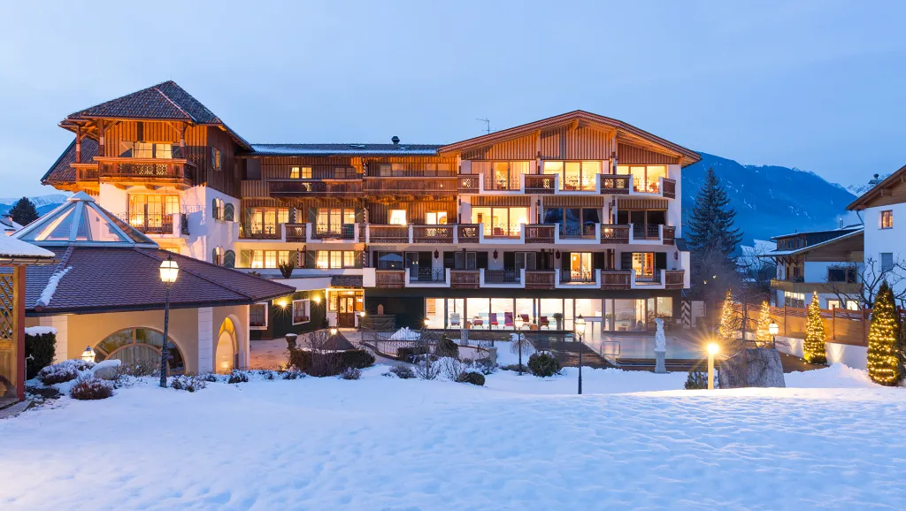 Exterior of the Mirabell Hotel in winter with snow