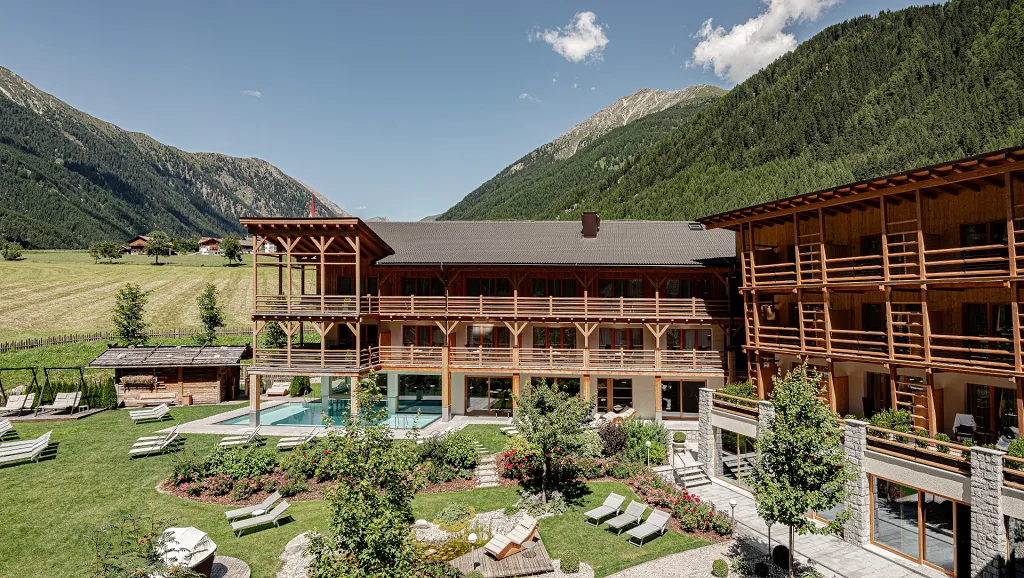 Outdoor garden with pool in summer of Hotel Masl